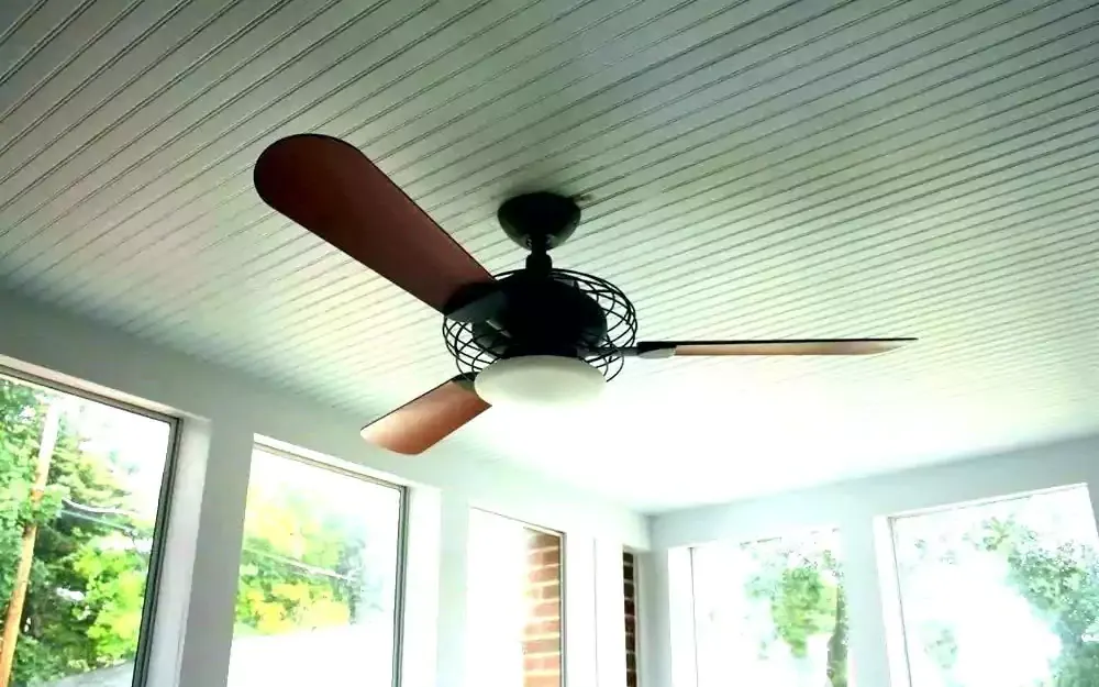 Ceiling fan fitted to a patio cover ceiling