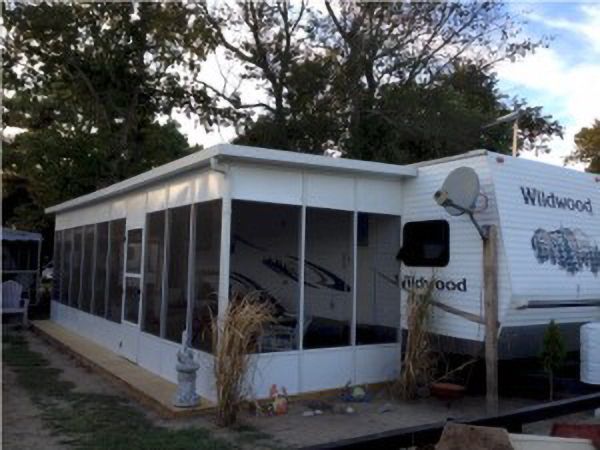 Screen room attached to a Wildwood travel trailer