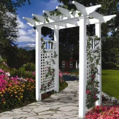 White Fairfield arbour with lattice sides on a flagstone path